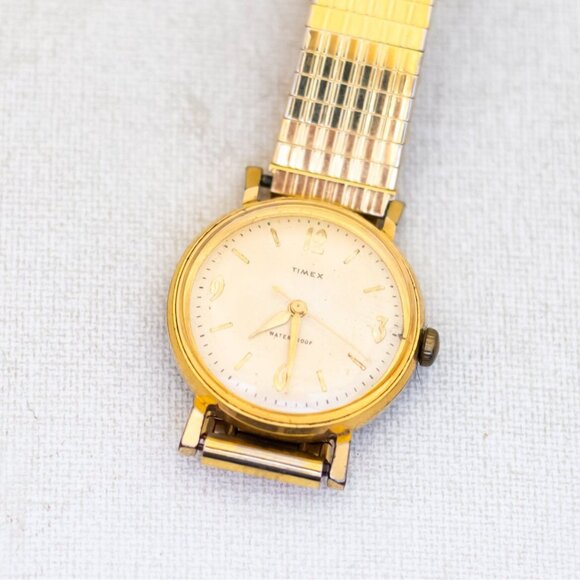 7 inch, Vintage Simplistic Round Gold Tone Watch by Timex - T25 - Picture 1 of 3